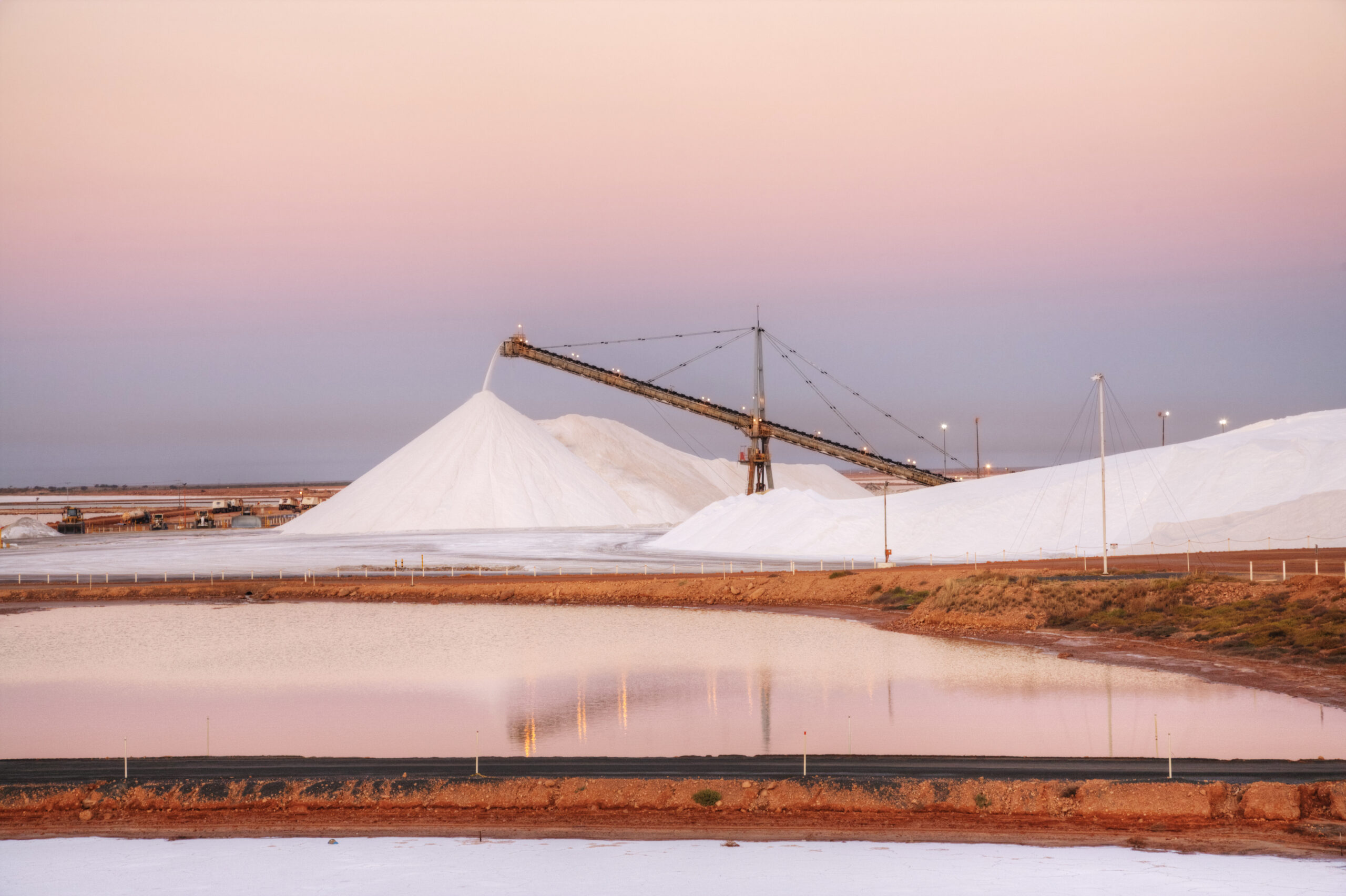 Elevator,delivering,salt,onto,stockpile,at,port,hedland,,western,australia